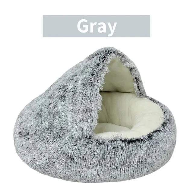 A warm and fluffy hooded pet bed designed to give cats and small dogs a cozy, secure place to rest and sleep