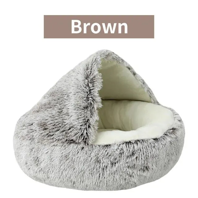 A warm and fluffy hooded pet bed designed to give cats and small dogs a cozy, secure place to rest and sleep